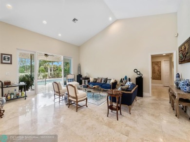 Exceptional home in Boca Woods Country Club combines luxury and on Boca Woods Country Club in Florida - for sale on GolfHomes.com, golf home, golf lot