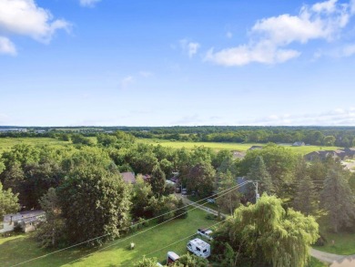 Welcome to this 3-bedroom, 2-bath ranch located on Oak Ridge on Oak Ridge Golf Course in Wisconsin - for sale on GolfHomes.com, golf home, golf lot