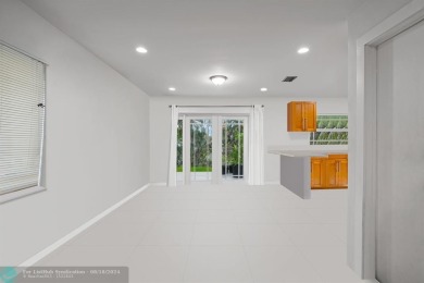 Nestled in the heart of Doral Park, this stunning 4-bedroom, 2 on Jim McLean Signature Course in Florida - for sale on GolfHomes.com, golf home, golf lot