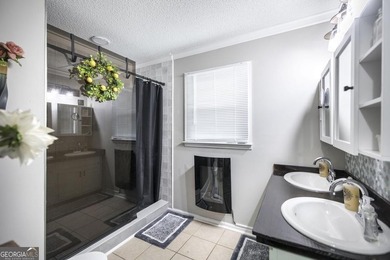 Gnome Sweet Gnome! Thoughtful improvements add practicality and on Golf Club of Macon in Georgia - for sale on GolfHomes.com, golf home, golf lot