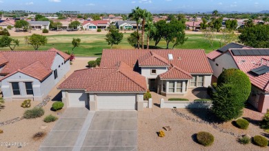 Discover this popular Palo Verde model nestled on the 7th green on Sun City Grand Golf Couse and Club in Arizona - for sale on GolfHomes.com, golf home, golf lot