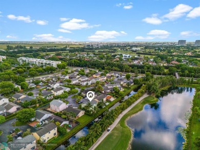 Nestled in the heart of Doral Park, this stunning 4-bedroom, 2 on Jim McLean Signature Course in Florida - for sale on GolfHomes.com, golf home, golf lot