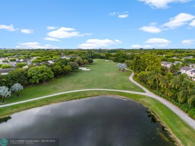 Nestled in the heart of Doral Park, this stunning 4-bedroom, 2 on Jim McLean Signature Course in Florida - for sale on GolfHomes.com, golf home, golf lot