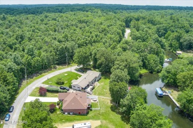 Charming Lakefront home! Embrace a lifestyle of comfort and on Lake Tansi Village Country Club in Tennessee - for sale on GolfHomes.com, golf home, golf lot