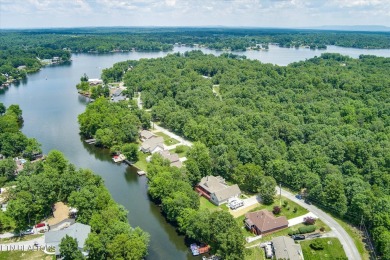 Charming Lakefront home! Embrace a lifestyle of comfort and on Lake Tansi Village Country Club in Tennessee - for sale on GolfHomes.com, golf home, golf lot