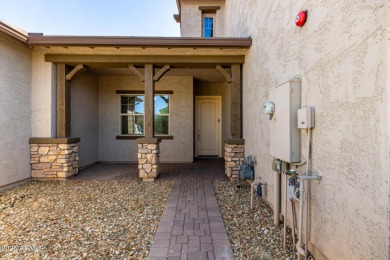 Live the Palm Valley lifestyle in this gated, low-maintenance on Palm Valley Golf Club  in Arizona - for sale on GolfHomes.com, golf home, golf lot