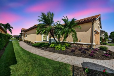 Luxuriously Upgraded Roma Model with Pond Views & Room for a on Esplanade Golf and Country at Lakewood Ranch in Florida - for sale on GolfHomes.com, golf home, golf lot