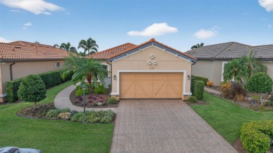 Luxuriously Upgraded Roma Model with Pond Views & Room for a on Esplanade Golf and Country at Lakewood Ranch in Florida - for sale on GolfHomes.com, golf home, golf lot