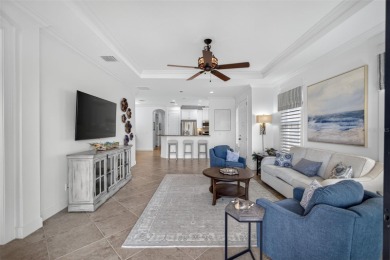 Luxuriously Upgraded Roma Model with Pond Views & Room for a on Esplanade Golf and Country at Lakewood Ranch in Florida - for sale on GolfHomes.com, golf home, golf lot