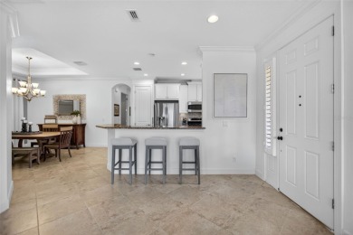 Luxuriously Upgraded Roma Model with Pond Views & Room for a on Esplanade Golf and Country at Lakewood Ranch in Florida - for sale on GolfHomes.com, golf home, golf lot
