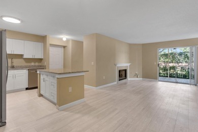 One or more photo(s) has been virtually staged. AS GOOD AS NEW! on Hunters Green Country Club in Florida - for sale on GolfHomes.com, golf home, golf lot