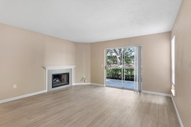 One or more photo(s) has been virtually staged. AS GOOD AS NEW! on Hunters Green Country Club in Florida - for sale on GolfHomes.com, golf home, golf lot