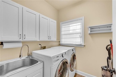 Resort-style living awaits in this beautifully appointed on Royal Lakes Golf and Country Club in Georgia - for sale on GolfHomes.com, golf home, golf lot