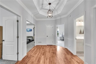 Resort-style living awaits in this beautifully appointed on Royal Lakes Golf and Country Club in Georgia - for sale on GolfHomes.com, golf home, golf lot