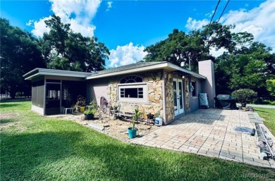 Welcome to this home in Citrus Springs, FL situated on over 1/2 on Citrus Springs Country Club in Florida - for sale on GolfHomes.com, golf home, golf lot