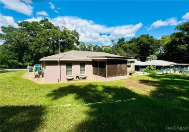 Welcome to this home in Citrus Springs, FL situated on over 1/2 on Citrus Springs Country Club in Florida - for sale on GolfHomes.com, golf home, golf lot