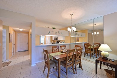 Welcome to this bright and airy first-floor condo in the on Peridia Golf and Country Club in Florida - for sale on GolfHomes.com, golf home, golf lot