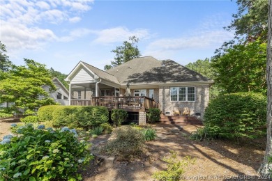 This custom executive home is not just a residence; it's a on Carolina Trace Country Club in North Carolina - for sale on GolfHomes.com, golf home, golf lot