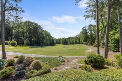 This custom executive home is not just a residence; it's a on Carolina Trace Country Club in North Carolina - for sale on GolfHomes.com, golf home, golf lot