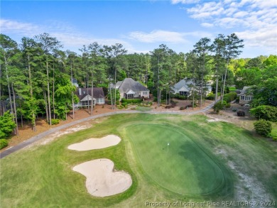 This custom executive home is not just a residence; it's a on Carolina Trace Country Club in North Carolina - for sale on GolfHomes.com, golf home, golf lot