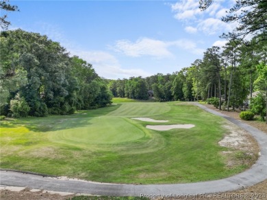 This custom executive home is not just a residence; it's a on Carolina Trace Country Club in North Carolina - for sale on GolfHomes.com, golf home, golf lot