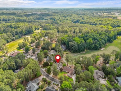 This custom executive home is not just a residence; it's a on Carolina Trace Country Club in North Carolina - for sale on GolfHomes.com, golf home, golf lot