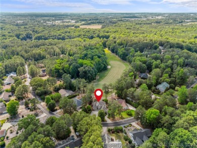 This custom executive home is not just a residence; it's a on Carolina Trace Country Club in North Carolina - for sale on GolfHomes.com, golf home, golf lot