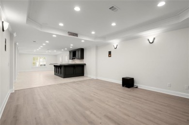 This SHOW STOPPER is a stunning 7-bedroom, 5.5-bathroom home on Bridgemill Golf Club in Georgia - for sale on GolfHomes.com, golf home, golf lot