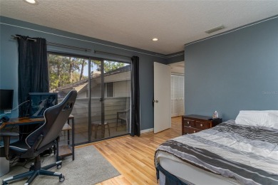 Nestled under the mature trees, in a very quiet subdivision is on Saddlebrook Golf and Country Club in Florida - for sale on GolfHomes.com, golf home, golf lot