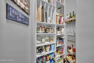 This exceptional home blends refined finishes, thoughtful design on Cape Fear National At Brunswick Forest in North Carolina - for sale on GolfHomes.com, golf home, golf lot