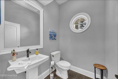 This exceptional home blends refined finishes, thoughtful design on Cape Fear National At Brunswick Forest in North Carolina - for sale on GolfHomes.com, golf home, golf lot