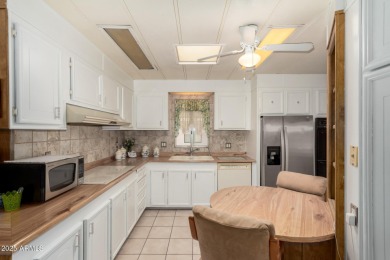 Step into your ideal 55+ lifestyle w/ this 2-bed/2-bath home in on Sun Lakes Country Club in Arizona - for sale on GolfHomes.com, golf home, golf lot
