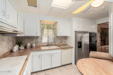Step into your ideal 55+ lifestyle w/ this 2-bed/2-bath home in on Sun Lakes Country Club in Arizona - for sale on GolfHomes.com, golf home, golf lot