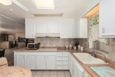 Step into your ideal 55+ lifestyle w/ this 2-bed/2-bath home in on Sun Lakes Country Club in Arizona - for sale on GolfHomes.com, golf home, golf lot