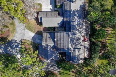 Nestled under the mature trees, in a very quiet subdivision is on Saddlebrook Golf and Country Club in Florida - for sale on GolfHomes.com, golf home, golf lot