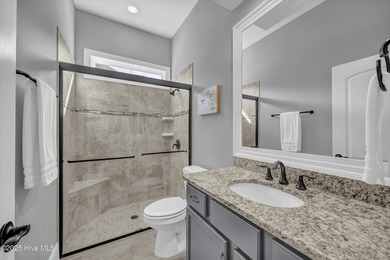 This exceptional home blends refined finishes, thoughtful design on Cape Fear National At Brunswick Forest in North Carolina - for sale on GolfHomes.com, golf home, golf lot