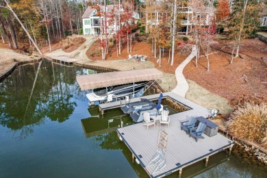 This stunning 4-bedroom, 4.5-bath lakefront home on the Richland on Harbor Club Golf and Country Club in Georgia - for sale on GolfHomes.com, golf home, golf lot