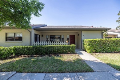 Step through the front door of this charming villa, and you feel on Emerald Greens Golf Resort and Country Club in Florida - for sale on GolfHomes.com, golf home, golf lot