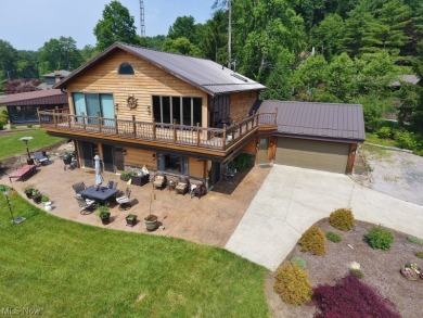 Phenomenal lake views, a fabulous home w/ a private dock await on Atwood Lake Resort Golf Course in Ohio - for sale on GolfHomes.com, golf home, golf lot