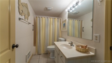 SPACIOUS, GREAT LOCATION, VIEW OF GOLF COURSE AND LAKE - This on The Oaks Golf Course in Missouri - for sale on GolfHomes.com, golf home, golf lot