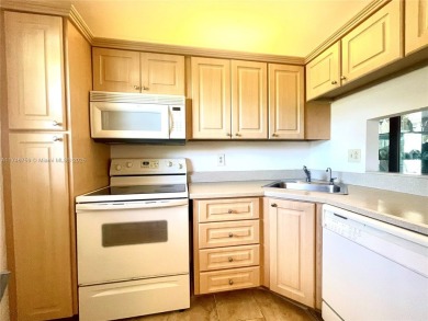 JUST REDUCED!!!This charming corner unit is nestled in Rokest on Colony West Country Club in Florida - for sale on GolfHomes.com, golf home, golf lot