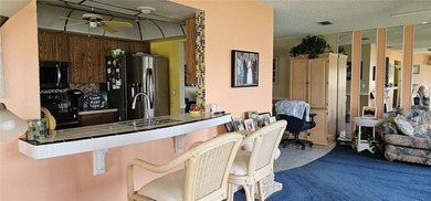 Located in the very desirable and affordable Mainlands of on Mainlands Golf Club in Florida - for sale on GolfHomes.com, golf home, golf lot