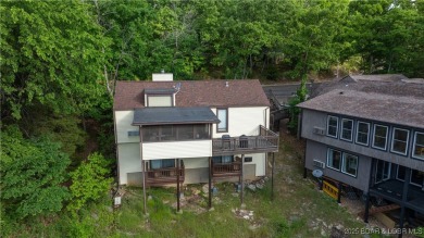 SPACIOUS, GREAT LOCATION, VIEW OF GOLF COURSE AND LAKE - This on The Oaks Golf Course in Missouri - for sale on GolfHomes.com, golf home, golf lot