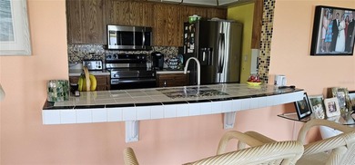 Located in the very desirable and affordable Mainlands of on Mainlands Golf Club in Florida - for sale on GolfHomes.com, golf home, golf lot