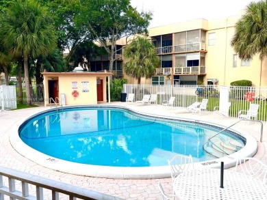 JUST REDUCED!!!This charming corner unit is nestled in Rokest on Colony West Country Club in Florida - for sale on GolfHomes.com, golf home, golf lot