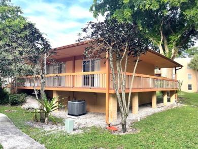 JUST REDUCED!!!This charming corner unit is nestled in Rokest on Colony West Country Club in Florida - for sale on GolfHomes.com, golf home, golf lot