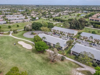 Welcome to this inviting golf-view unit! An updated kitchen on The Golf Club of Jupiter in Florida - for sale on GolfHomes.com, golf home, golf lot