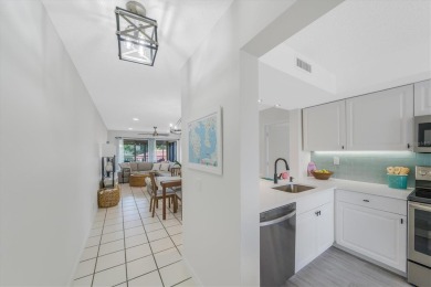TOP FLOOR, END UNIT! Discover a slice of paradise at 6372 Palma on Isla Del Sol Yacht and Country Club in Florida - for sale on GolfHomes.com, golf home, golf lot