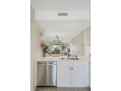 TOP FLOOR, END UNIT! Discover a slice of paradise at 6372 Palma on Isla Del Sol Yacht and Country Club in Florida - for sale on GolfHomes.com, golf home, golf lot
