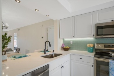 TOP FLOOR, END UNIT! Discover a slice of paradise at 6372 Palma on Isla Del Sol Yacht and Country Club in Florida - for sale on GolfHomes.com, golf home, golf lot